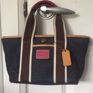 The Coach Hampton weekend tote handbag!!